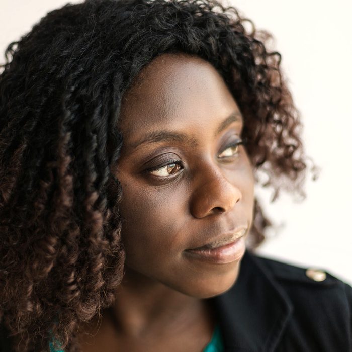 A young woman photographed in soft natural light